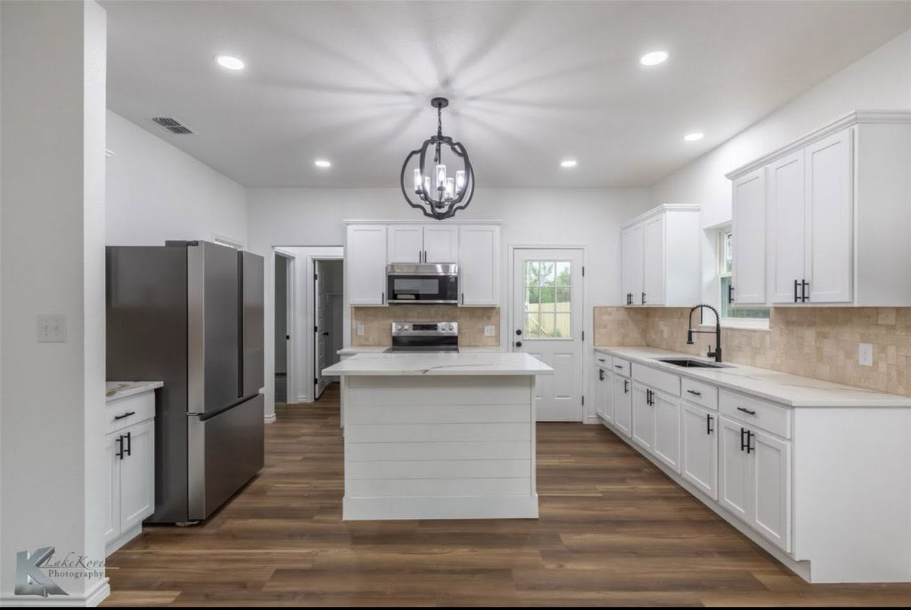 Completed kitchen cabinetry and island